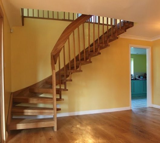 wooden open riser stair on a wooden floor