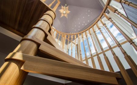 Model 71 Staircase - Tilford A view looking up at a Model 71 spiral staircase in Tilford