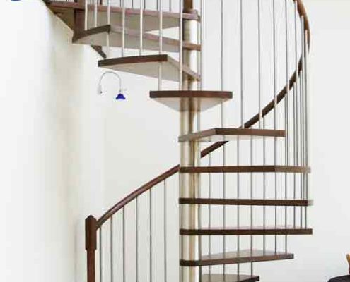 dark timber spiral staircase with stainless steel spindles