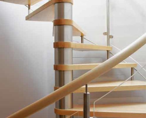 maple wood spiral staircase with curved panel balustrade