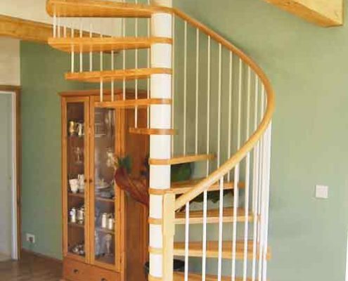 white steel spiral staircase with oak treads