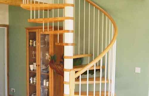 white steel spiral staircase with oak treads