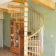 white steel spiral staircase with oak treads