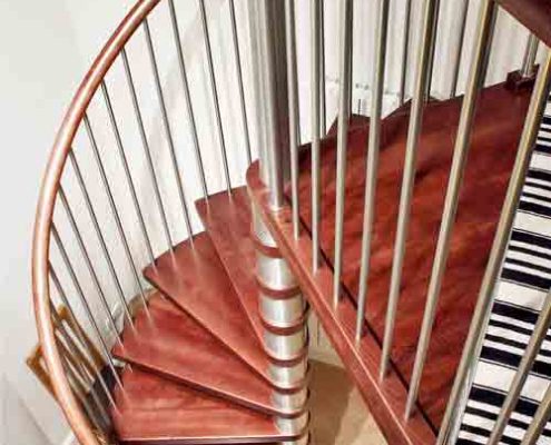 red timber spiral staircase with stainless spindles