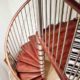 red timber spiral staircase with stainless spindles