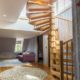 house with oak floor and oak spiral staircase rising up