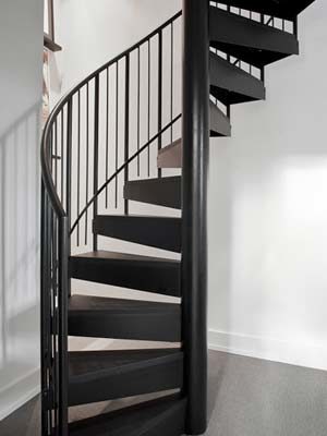Normal-Steel Spindles on a black spiral staircase