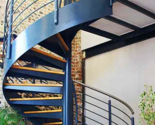 dark blue outer stringer on an office spiral staircase