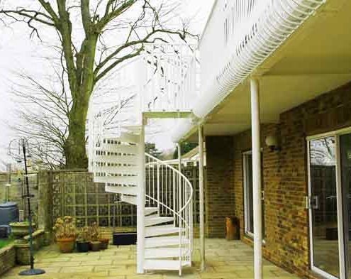white spiral staircase to back of house