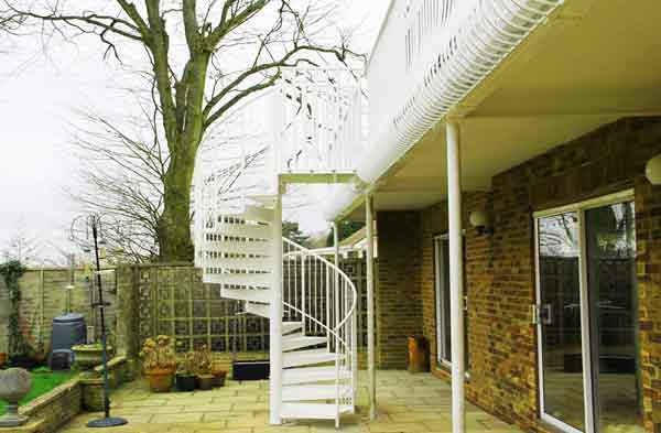 white spiral staircase to back of house