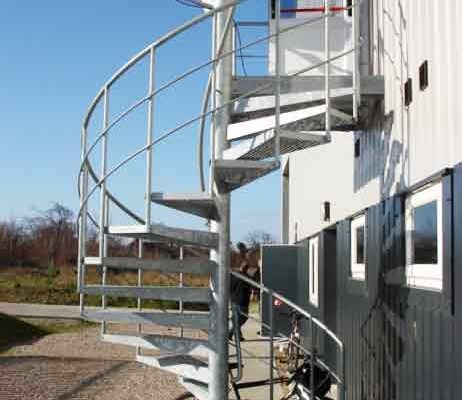 spiral stair fire escape outside a factory