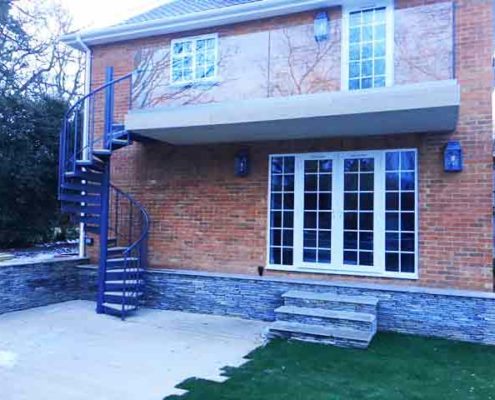 suspended outdoor balcony with frameless glass balustrade