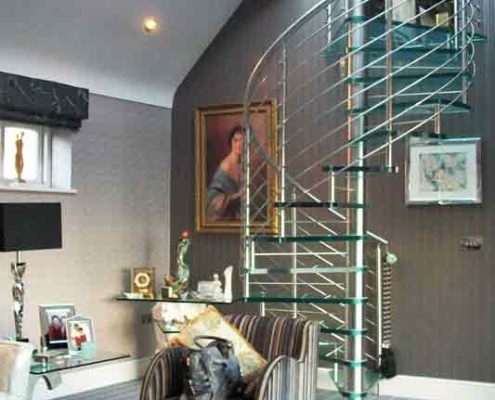 glass spiral stair to back of living room