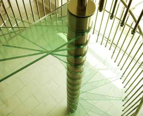 large glass platform on a spiral staircase