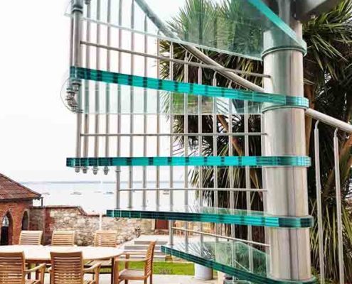 glass steps on an outside spiral staircase