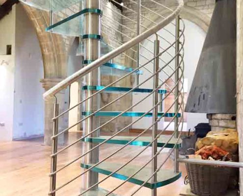 stainless steel balustrade on a glass step spiral stair