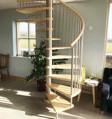 modern stainless steel and light wood spiral stair