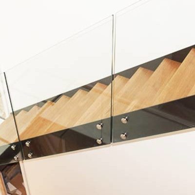 Frameless-Glass Frameless Glass Balustrade to side of modern staircase