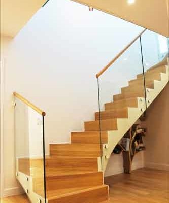 closer riser wooden step staircase with glass balustrade