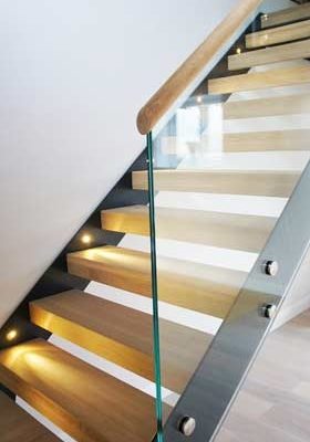 side of glass balustrade on a staircase