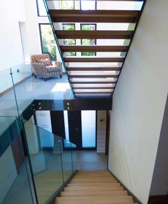 two straight stairs with open wooden steps