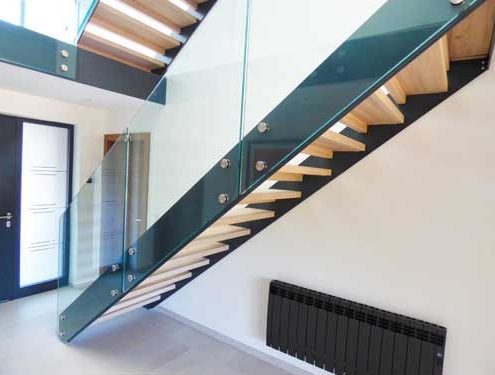 straight dark grey steel staircase with frameless glass