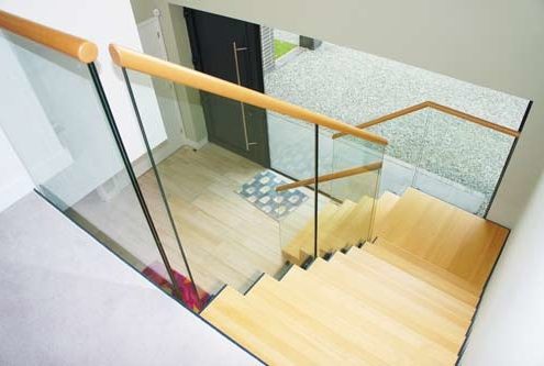 beech step staircase with frameless glass