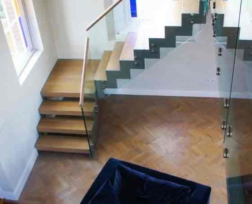 large modern stair in front of a window