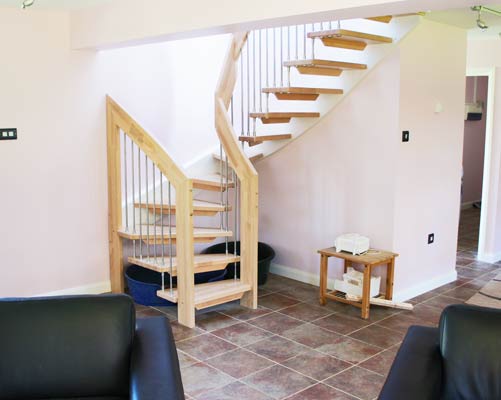 half turn with beech treads and handrail with tiled floor