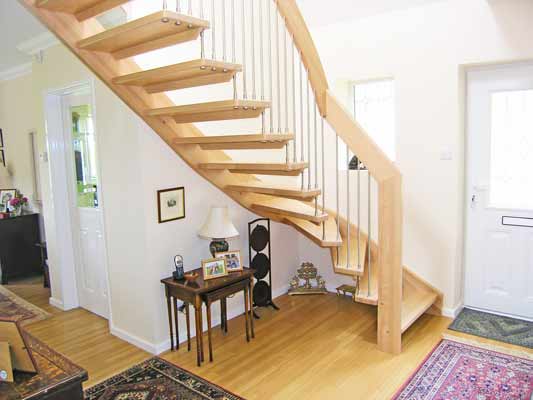 timber floor in a hallway with a quarter timber staircase with open risers