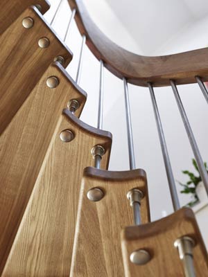 close up of underside of steps on a wooden stair