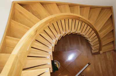 curving handrail in oak
