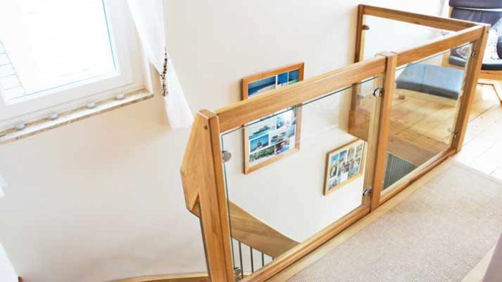 landing balustrade with oak frame and glass infill panels