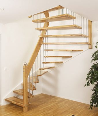 floating staircase with open treads with white wall background