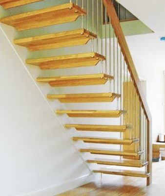 view from rear of floating style wooden staircase