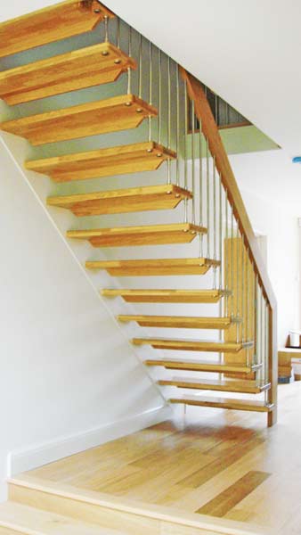 view from rear of floating style wooden staircase