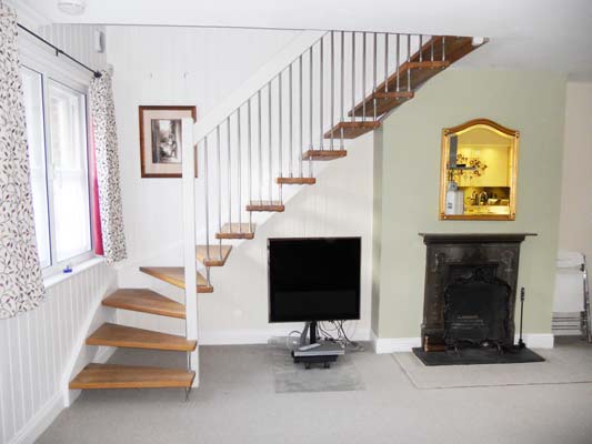 white and dark wood timber staircase with open risers