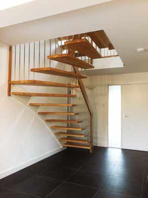 floating wooden staircase with open risers