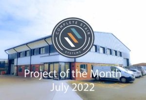 project of the month visual with office building and company logo