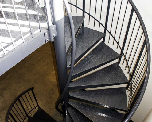 chequer plate steel steps on a steel spiral staircase