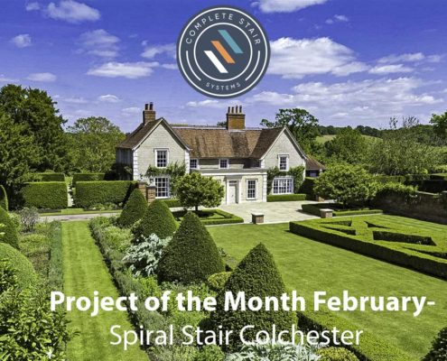 well kept gardens and woodland with large house