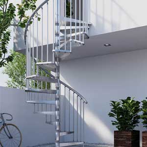 galvanised steel spiral with black handrail with plants and trees surrounding