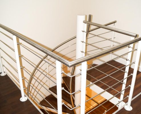 landing balustrade around an opening with a spiral staircase
