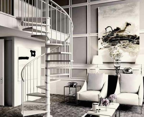 apartment with two chairs and painting on wall with light spiral stair running upto to a mezzanine level