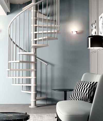 living space with light blue wall and soft seat with spiral staircase in light timber