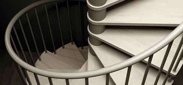 looking down on the light wooden steps of the C20 spiral staircase