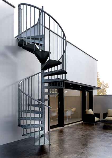 galvanised spiral stair running up the side of a domestic property