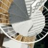 the triangular platform of a galvanised outdoor spiral stair