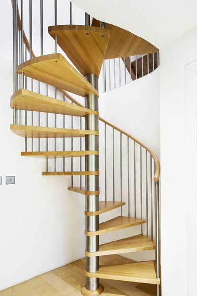 spiral stair with wooden steps and stainless steel spindles