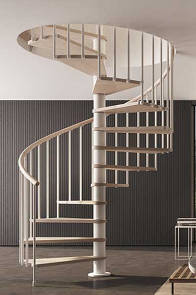 spiral stair with a grey timber wall behind